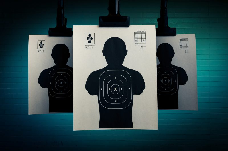 Shooting targets on a grey background on a dark background